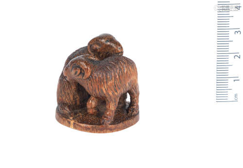 19th century A bamboo netsuke of two goats