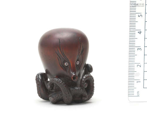 By Rango, 19th century A wood netsuke of an octopus