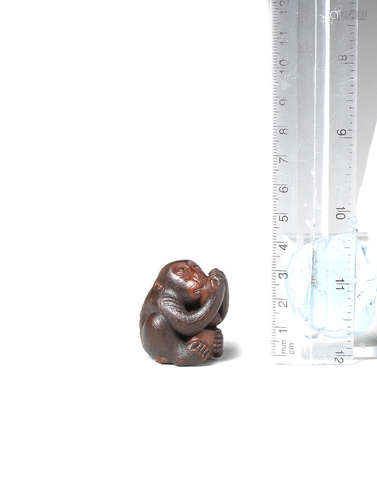 By Kijin Naoaki, 19th century A wood netsuke of a monkey