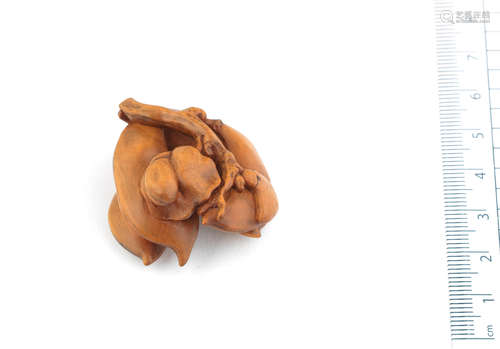 By Masanao, Yamada, Ise Province, 19th century A wood netsuke of edamame (soybeans)