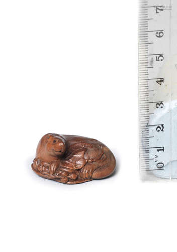 By Ichimin, Nagoya, 19th century  A small wood netsuke of a squirrel