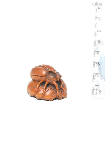 Style of Masanao of Yamada, Ise Province, 19th century A wood netsuke of a beetle