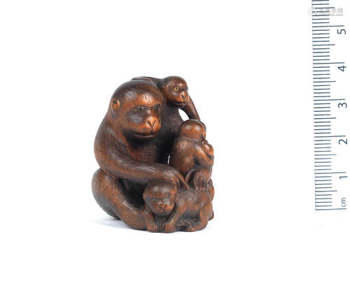 By Ran'ichi, Kyoto, 19th century A wood netsuke of a monkey and young