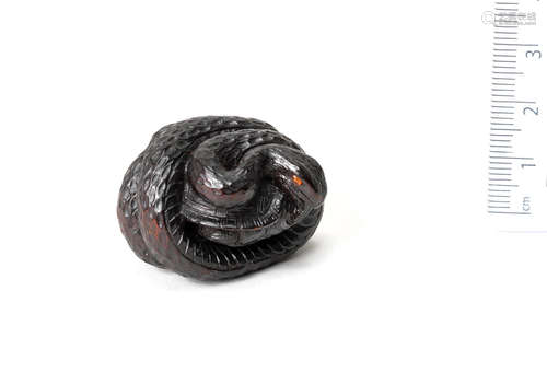 By Yukitomo, Gifu, Mino Province, 19th century A wood netsuke of a snake and tortoise