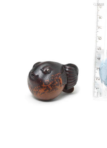 By Michael Webb (1934-2011), Yorkshire, England, 1986 A boxwood netsuke of a fugu (puffer) fish