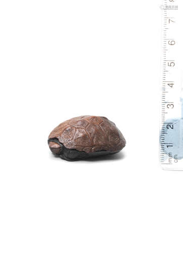 By Naokazu (Shoichi), 19th century A wood netsuke of a tortoise