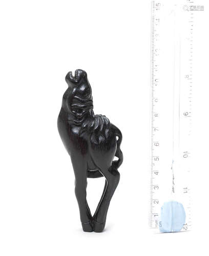 18th century A large kurogaki-wood netsuke of a horse