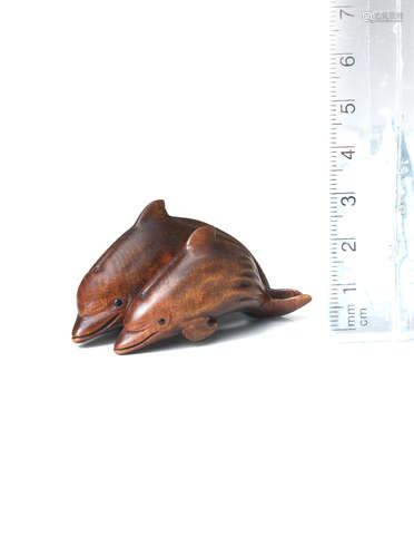 By Michael Webb (1934-2011), Yorkshire, England, 1988 A wood netsuke of two dolphins