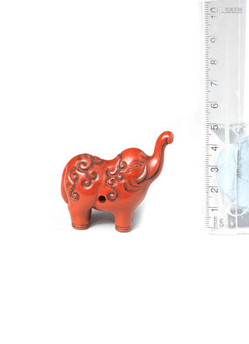 19th Century A red lacquer netsuke of an elephant