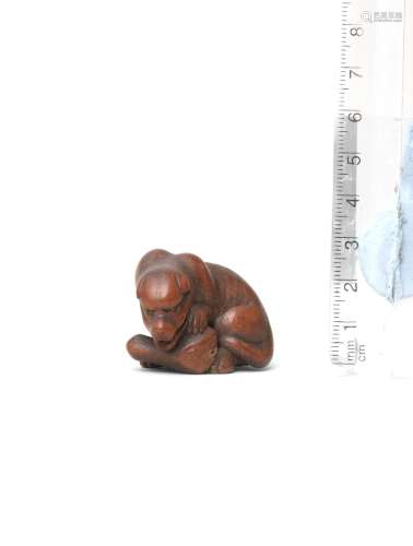 By Hogen Tadayoshi, Nagoya, 19th century A wood netsuke of a wolf