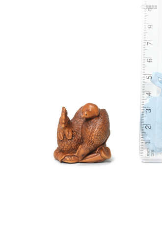 By Kaigyokusai Masatsugu or Kaigyokudo Masateru, Osaka, late 19th century A wood netsuke of a family of chickens