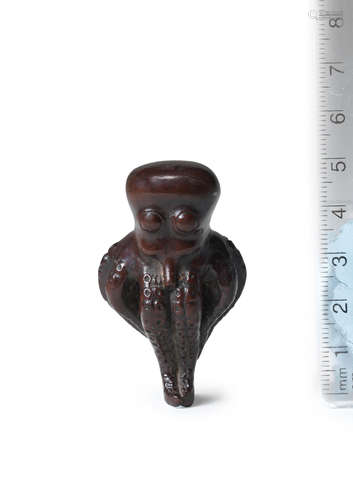 19th century A wood netsuke of an octopus