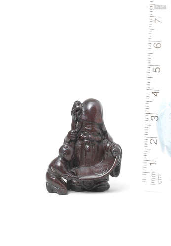 After Kano Tomokazu, Gifu, 19th century A small ebony netsuke of Jurojin