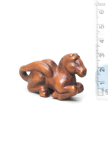 18th century A wood netsuke of a horse