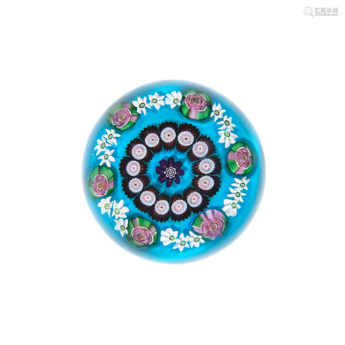 A Clichy patterned millefiori turquoise-ground paperweight, circa 1850