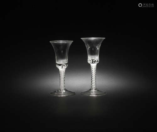 Two similar opaque twist wine glasses, circa 1765