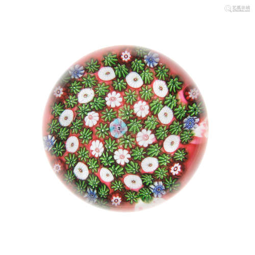 A Clichy pink-ground patterned millefiori paperweight, circa 1850