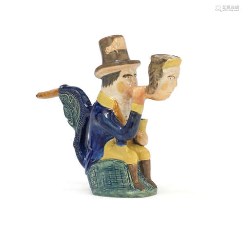 A rare Prattware figural pipe, circa 1800