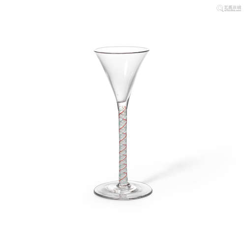 A rare colour-twist toasting glass, circa 1765