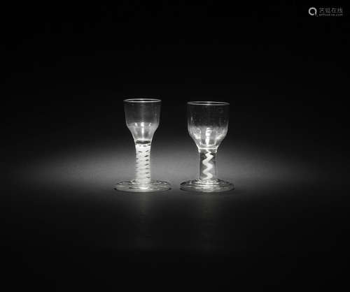 Two opaque twist firing glasses, circa 1760-65