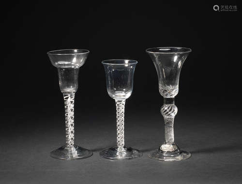 Three mixed-twist wine glasses, circa 1755-65