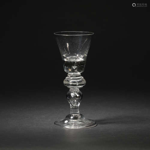 A Heavy baluster wine glass, circa 1720