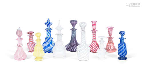 Eleven French glass scent or perfume bottles and stoppers with latticinio decoration, circa 1850