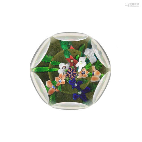 A fine and rare St. Louis faceted flat bouquet colour-ground paperweight, circa 1850