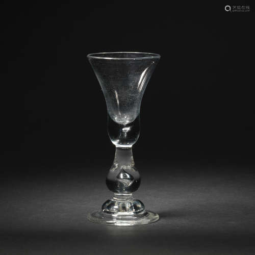 A heavy baluster small wine glass, circa 1720-30