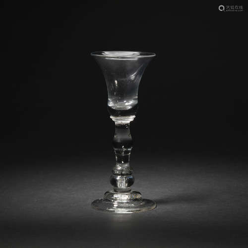 A baluster wine glass, circa 1710-20