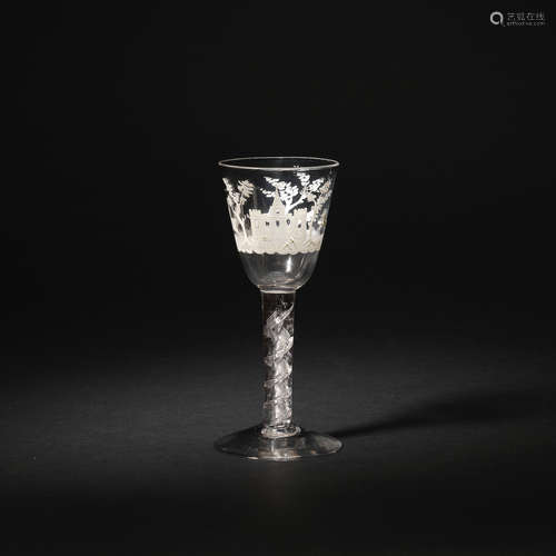 An airtwist wine glass with white enamelling, the glass circa 1760