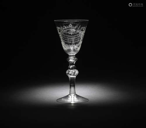 An important Dutch engraved light baluster wine goblet signed by Jacob Sang, dated 1762