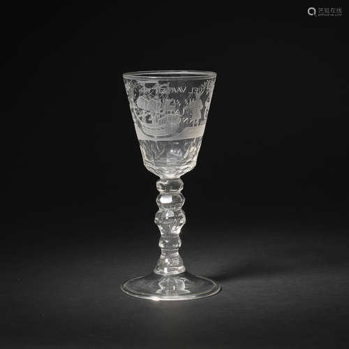 A Dutch or German faceted wine glass, dated 1761