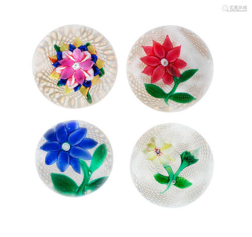 A New England Glass Co. dahlia paperweight and three Boston and Sandwich Glass Co. flower paperweights, circa 1860