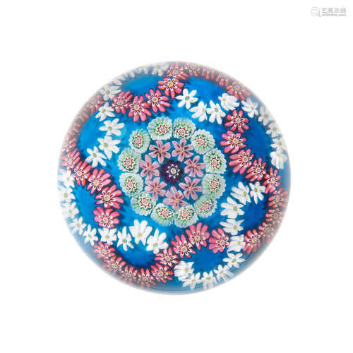 A Clichy turquoise-ground patterned millefiori paperweight, circa 1850