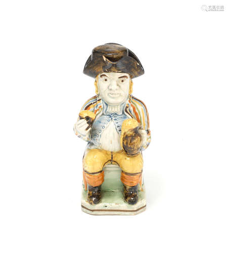 A very rare Prattware 'Postillion' Toby jug and cover, circa 1800-10