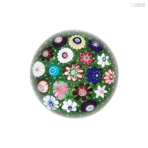 A very rare Clichy moss-ground spaced millefiori paperweight, circa 1850