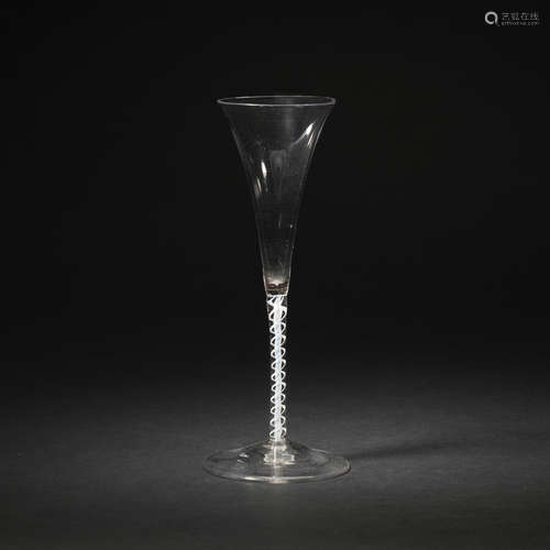 A rare opaque twist toasting glass or flute, circa 1765-70