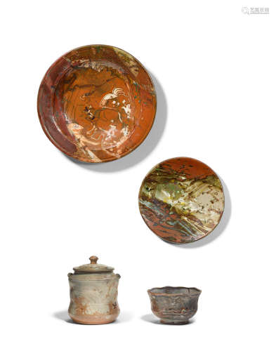 Group of Four Worksglazed stoneware, comprising: two chargers, incised 'Glick' and impressed 'PLUMTREE POTTERY'; covered jar incised 'Glick' and a bowl, unsignedheight of jar and bowl 8 3/4in (22cm) and 4 1/4in (11cm); diameters of chargers 17 1/2in (44.5cm) and 22 1/4in (56.5cm)  John Glick (1938-2017)