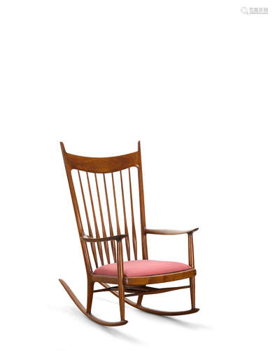 Rocking Chaircirca 1968walnut, upholsterybranded 'MALOOF designed made' and inscribed 'RUDOLPH 50.70'height 45in (114.5cm); width 28in (71.5cm); depth 42in (107cm)  Sam Maloof (1916-2009)