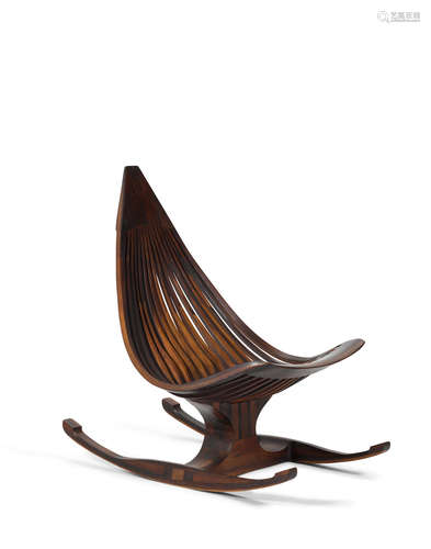 Rocking Chaircirca 1970hand carved and laminated figured woodfor Archetypo, carved 'Archetypo LXXII9'height 40in (101cm); width 27in (68cm); depth 38 1/2in (97cm)  Edward G. Livingston (Active 1970s)