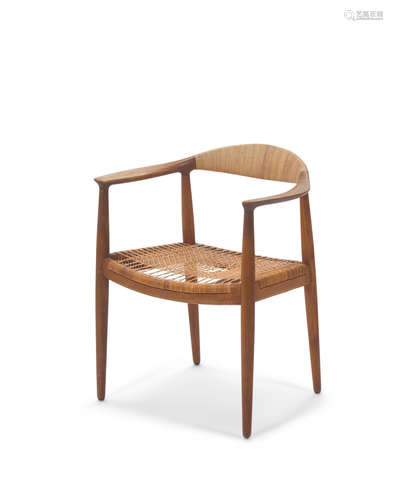 The Chair circa 1949for Johannes Hansen, teak, canebranded Johannes Hansen mark on undersideheight 30in (76cm); width 25in (64cm); depth 24in (61cm)  Hans J. Wegner (1914-2007)