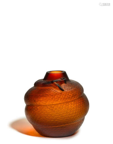 Serpent VaseMarcilhac 896, model introduced 1924deep amber, molded and frosted glass, intaglio mark 'R. LALIQUE'height 10 1/2in (26.7cm); diameter 9 1/2in (10cm)  René Lalique (1860-1945)