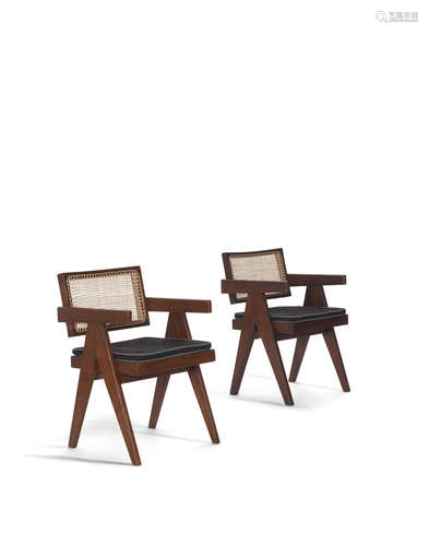 Pair of Office Armchairscirca 1955teak, cane, upholstery, one chair with hand applied and painted stencil mark 'MJ'height 30 1/2in (78cm); width 20in (51cm); depth 19in (49cm)  Pierre Jeanneret (1896-1967)