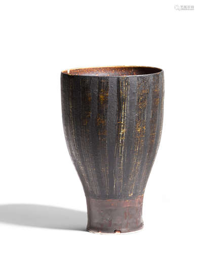 Vasecirca 1955porcelain, manganese with incised decoration, impressed with artist's seal 'LR'height 8in (20cm); diameter 5in (13cm)  Lucie Rie (1902-1995)