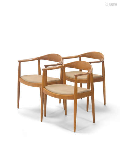 Three 'The Chairs'circa 1971model JH501, Johannes Hansen for Knoll International, oak, upholstery, each branded 'JOHANNES HANSEN COPENHAGEN DENMARK JH' and with Knoll International paper labelsheight 30 3/8in (77cm); width 24 3/4in (63cm); depth 18 1/2in (47cm)  Hans J. Wegner (1914-2007)