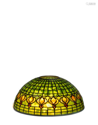 'Pomegranate' Shadecirca 1910leaded glass, patinated bronze, stamped 'TIFFANY STUDIOS NEW YORK'height 6in (15cm); diameter of shade 14in (35cm)  Tiffany Studios (1899-1919)