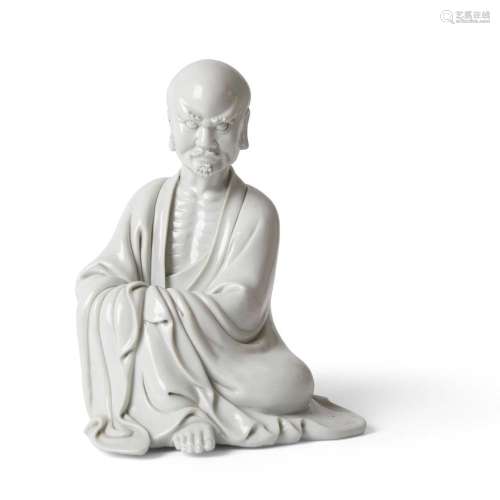 BLANC-DE-CHINE FIGURE OF A SEATED LUOHAN SIGNED CHEN WEI, 19TH CENTURY 25.5cm high