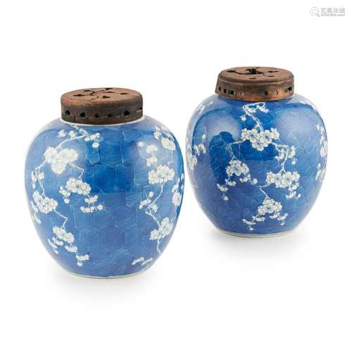PAIR OF BLUE AND WHITE 'CRACKED ICE AND PRUNUS' JARS AND COVERS QING DYNASTY, 19TH CENTURY 22cm high (excluding cover)