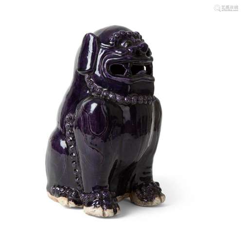 AUBERGINE-GLAZED BUDDHIST LION KANGXI PERIOD 33cm high